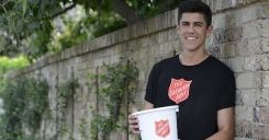 Young man volunteering for the Red Shield Appeal doorknock